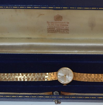 Lot 132 - Garrard: a 9ct yellow gold cocktail watch