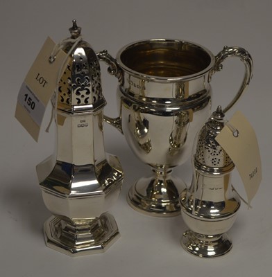 Lot 150 - A silver sugar caster, a pepperette and a trophy.