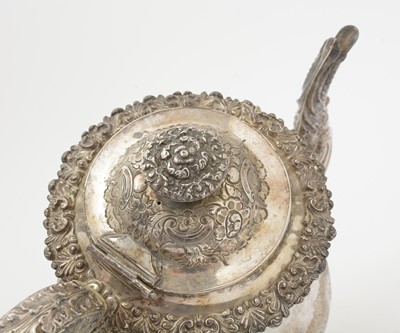 Lot 129 - A late period Old Sheffield plated coffee pot.