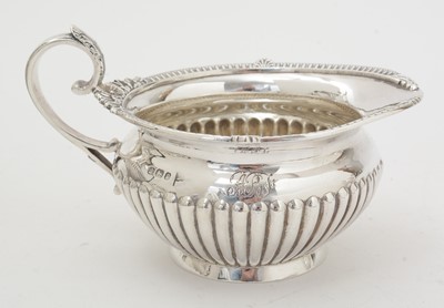 Lot 204 - A late Victorian silver four-piece tea and coffee service.