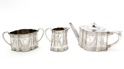 Lot 200 - A Victorian silver three-piece tea service.
