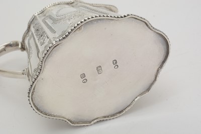 Lot 200 - A Victorian silver three-piece tea service.
