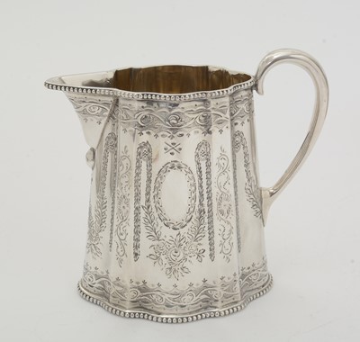 Lot 200 - A Victorian silver three-piece tea service.