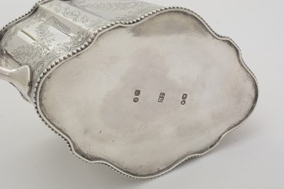 Lot 200 - A Victorian silver three-piece tea service.