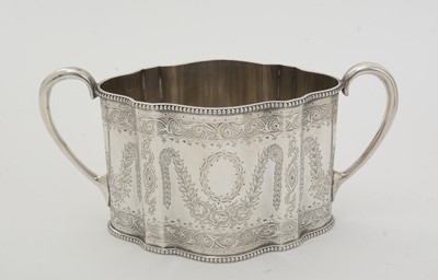 Lot 200 - A Victorian silver three-piece tea service.