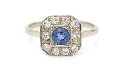 Lot 455 - A sapphire and diamond cluster ring