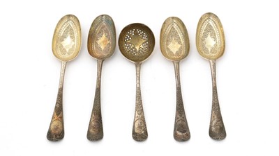 Lot 8 - Four George II silver tablespoons; and a silver sauce ladle.