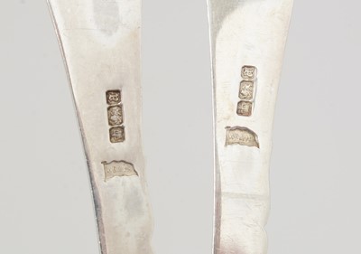 Lot 7 - A set of four late Victorian silver fruit serving spoons; and a pair of silver berry tablespoons.