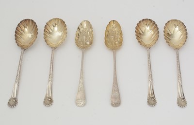 Lot 7 - A set of four late Victorian silver fruit serving spoons; and a pair of silver berry tablespoons.
