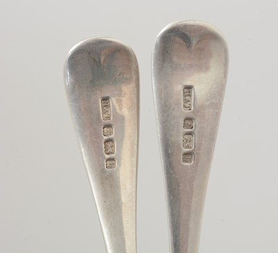 Lot 7 - A set of four late Victorian silver fruit serving spoons; and a pair of silver berry tablespoons.