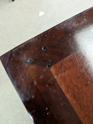 Lot 1112 - Manner of Mayhew & Ince: a George III mahogany and feather banded serving table.