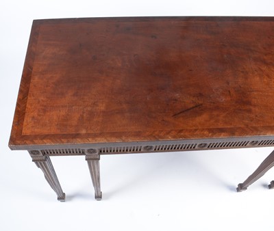 Lot 1112 - Manner of Mayhew & Ince: a George III mahogany and feather banded serving table.