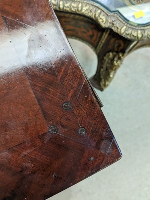Lot 1112 - Manner of Mayhew & Ince: a George III mahogany and feather banded serving table.