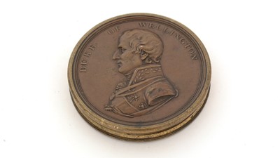 Lot 301 - An early 19th Century brass box resembling a medallion.