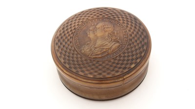 Lot 303 - An early George III pressed horn and engine-turned snuff box.