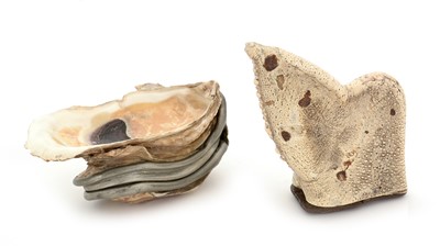 Lot 317 - A late 19th Century pewter-mounted oyster shell snuff box, and another.