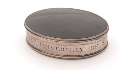 Lot 322 - A George II silver-mounted tortoiseshell tobacco box.