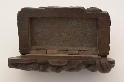 Lot 338 - A late Victorian Scottish carved wooden "blind man" snuff box