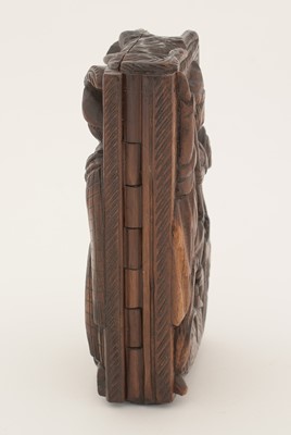 Lot 338 - A late Victorian Scottish carved wooden "blind man" snuff box