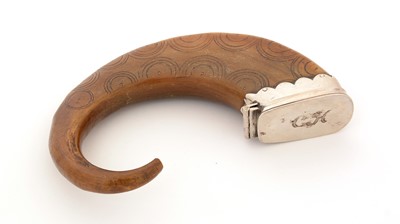 Lot 375 - An 18th Century Scottish silver-mounted curly horn snuff mull.