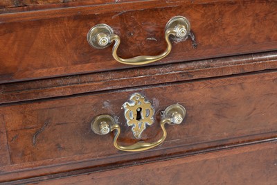 Lot 1115 - A Queen Anne walnut bureau bookcase.