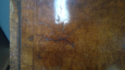 Lot 1115 - A Queen Anne walnut bureau bookcase.