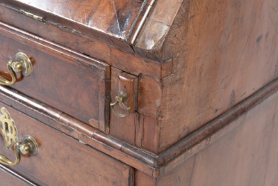 Lot 1115 - A Queen Anne walnut bureau bookcase.