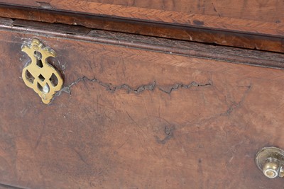 Lot 1115 - A Queen Anne walnut bureau bookcase.