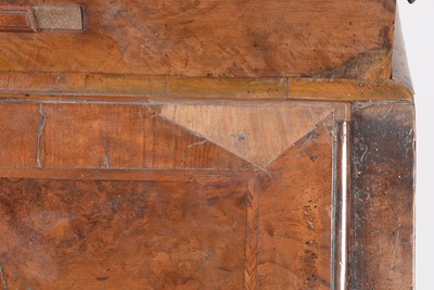 Lot 1115 - A Queen Anne walnut bureau bookcase.