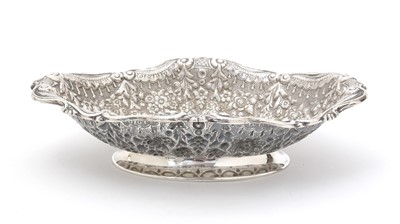Lot 138 - A late Victorian embossed silver dish.