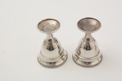 Lot 162 - A George III silver egg frame, four later egg spoons and four plated egg cups.