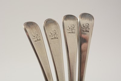 Lot 162 - A George III silver egg frame, four later egg spoons and four plated egg cups.