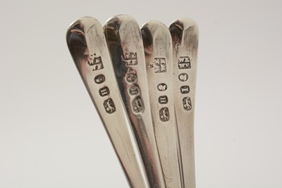 Lot 162 - A George III silver egg frame, four later egg spoons and four plated egg cups.