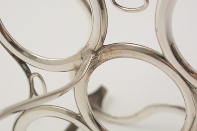 Lot 162 - A George III silver egg frame, four later egg spoons and four plated egg cups.