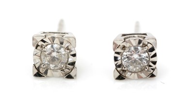 Lot 514 - A pair of diamond stud earrings