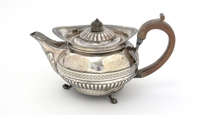 Lot 179 - A George III silver teapot.