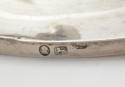 Lot 205 - A pair of George III silver sauce tureens and covers.