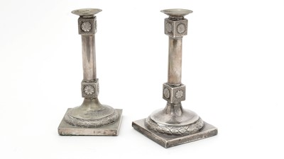 Lot 172 - Two very similar late 18th/early 19th Century candlesticks.