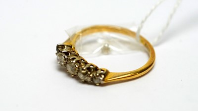 Lot 142 - A five stone diamond ring