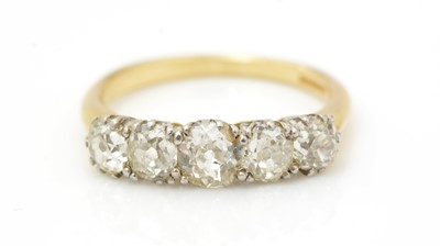 Lot 525 - A Victorian five stone diamond ring