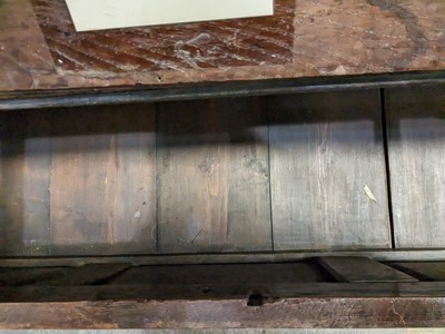 Lot 1104 - A North Country joined and carved oak box settle.