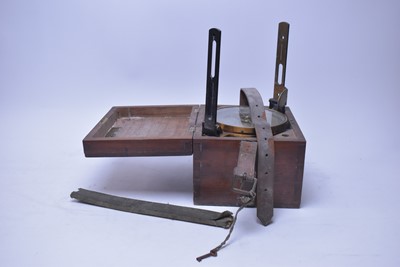 Lot 450 - An early 20th Century black lacquered brass surveyors' level, in mahogany carry case.