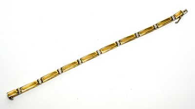 Lot 108 - A 9ct white and yellow gold bracelet