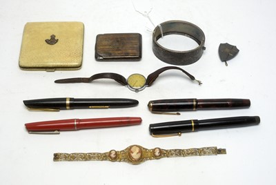 Lot 178 - A silver bangle;  a silver gilt filagree and carved shell cameo bracelet and other items