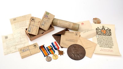 Lot 206 - A First World War medal group with memorial plaque