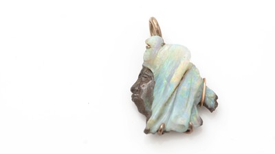 Lot 507 - A carved opal pendant