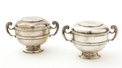 Lot 70 - A matched pair of Edwardian George V silver two handled cups