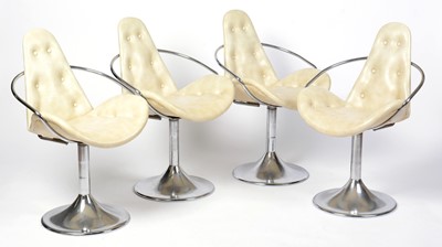 Lot 80 - A set of four stylish retro vintage mid 20th Century cocktail chairs upholstered in cream leather