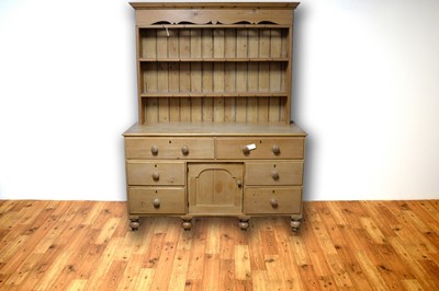 Lot 16 - A 20th Century pine kitchen dresser