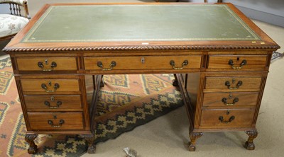 Lot 42 - A 20th Century mahogany writing desk.